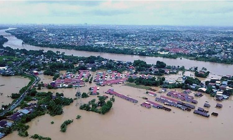 Floods and landslides kill eight in Indonesia