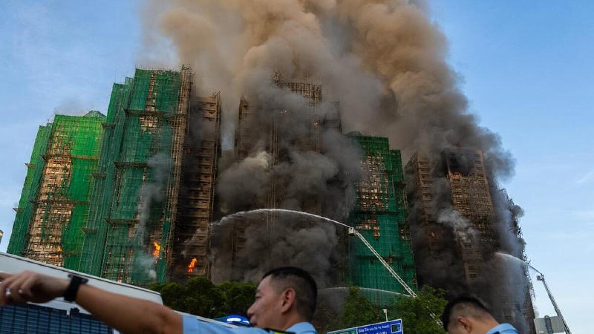 Four dead in Hong Kong housing estate fire: government