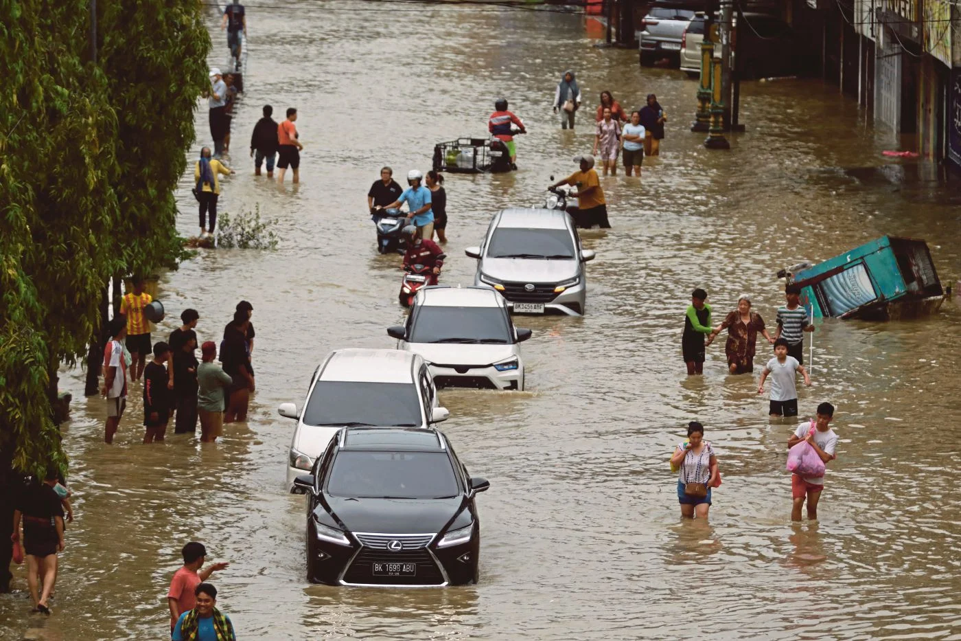 Death toll in Indonesia floods rises to more than 300: disaster agency