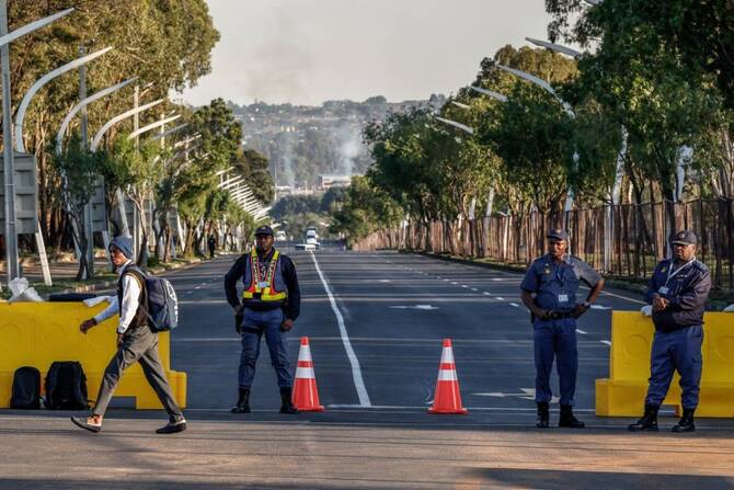 At least 10 killed in South Africa hostel shooting: police
