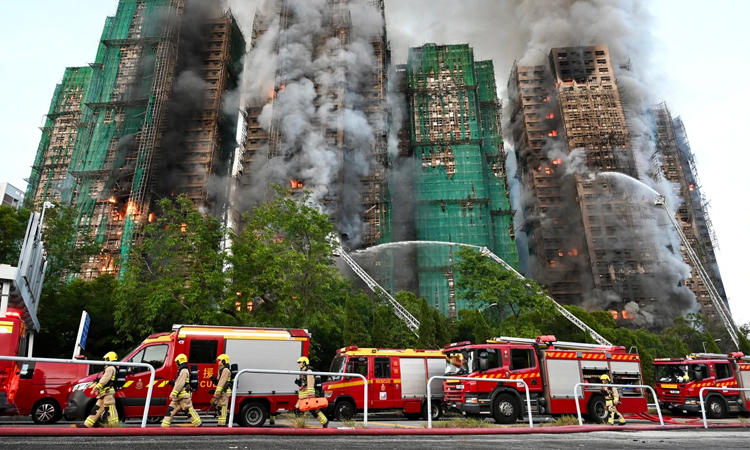 Fire kills 12 in south China residential building: state media