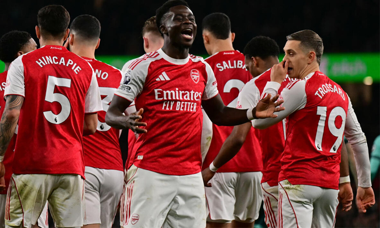 Two own goals save Arsenal blushes against Wolves