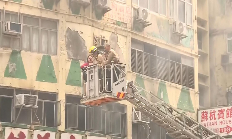 Tears at tribute to firefighter killed in Hong Kong blaze
