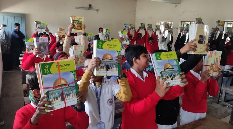 Students receive new textbooks on first day of New Year