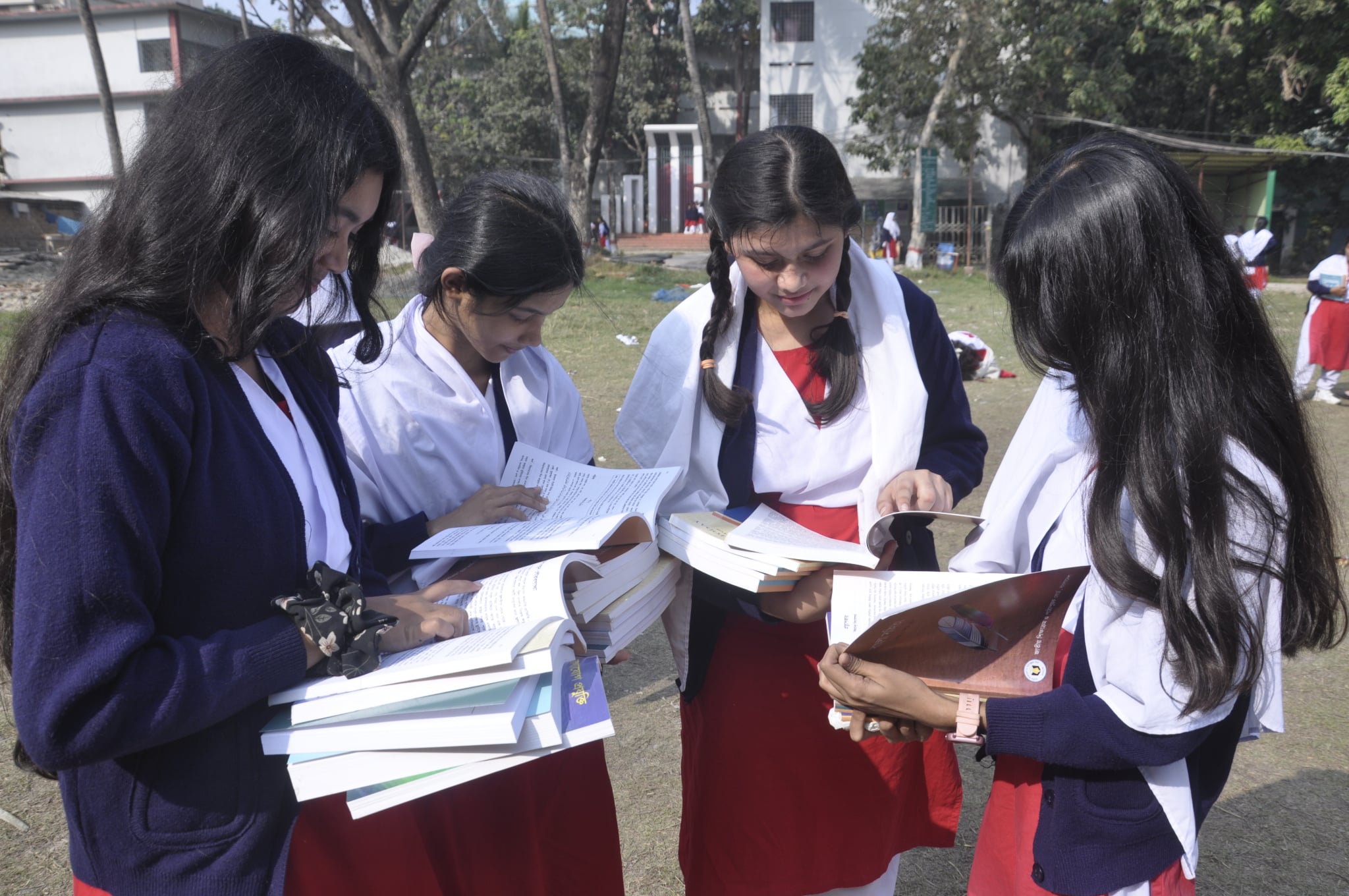 Khulna students happy to receive textbooks on 1st day of New Year