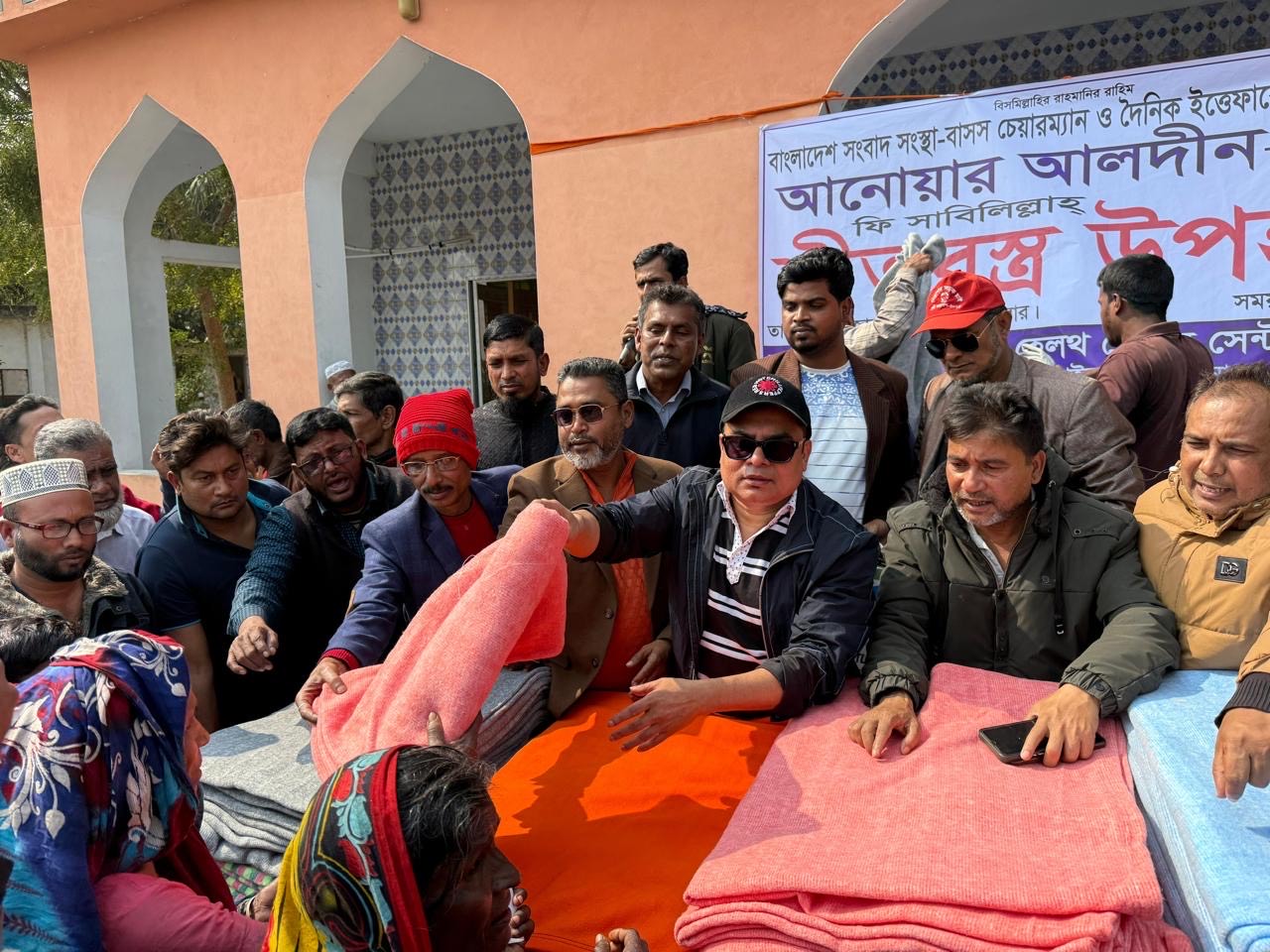 BSS chairman Anwar Aldin distributes blankets among destitute in Paikgachha 