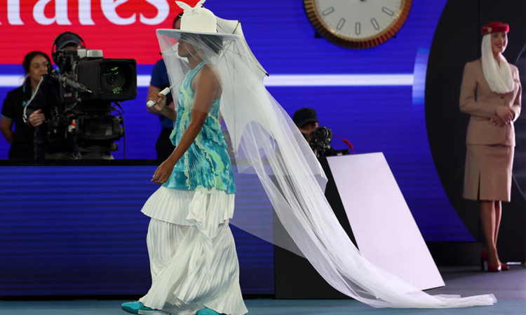 Osaka says 'I'm a little strange' after Melbourne fashion statement