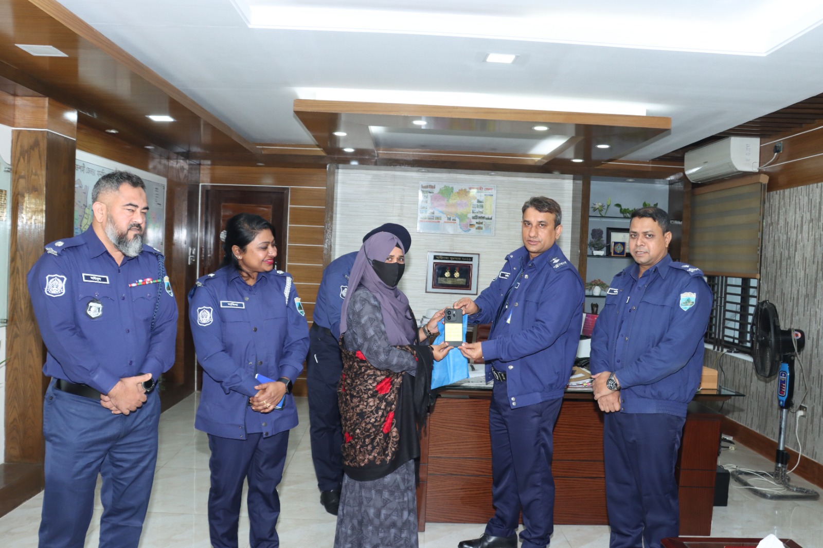 Police return 50 lost mobile phones to their owners in Rajshahi