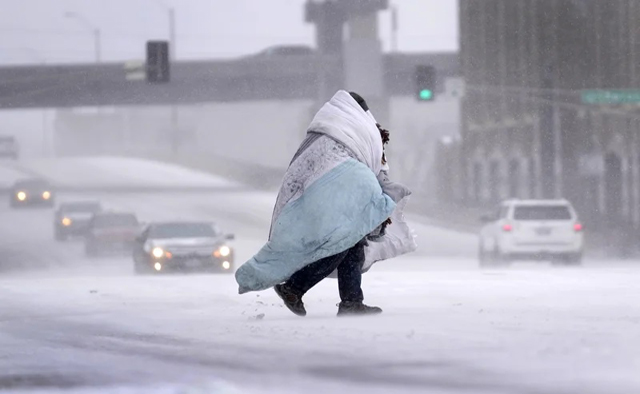 Massive winter storm sweeps across US bringing ice, frigid temps