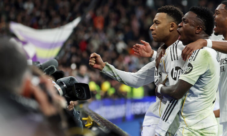 Mbappe penalty earns Real Madrid late win over nine-man Rayo