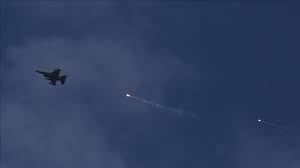 Warplanes and missiles seen in Iraq's airspace: witnesses, military source