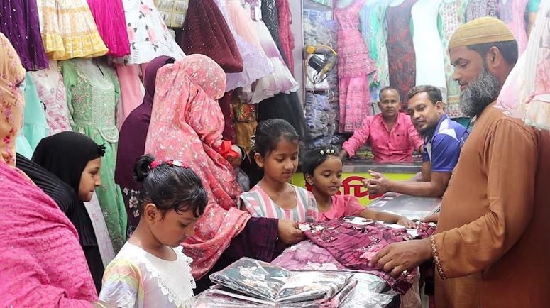 Markets bustling in Naogaon ahead of Eid festival