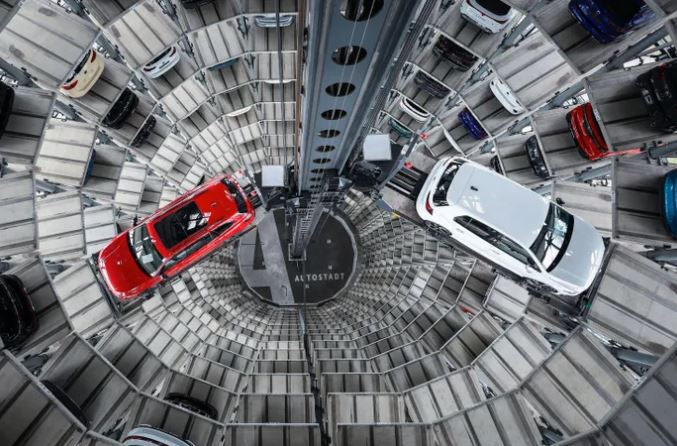 Volkswagen says to cut 50,000 jobs as profit slides