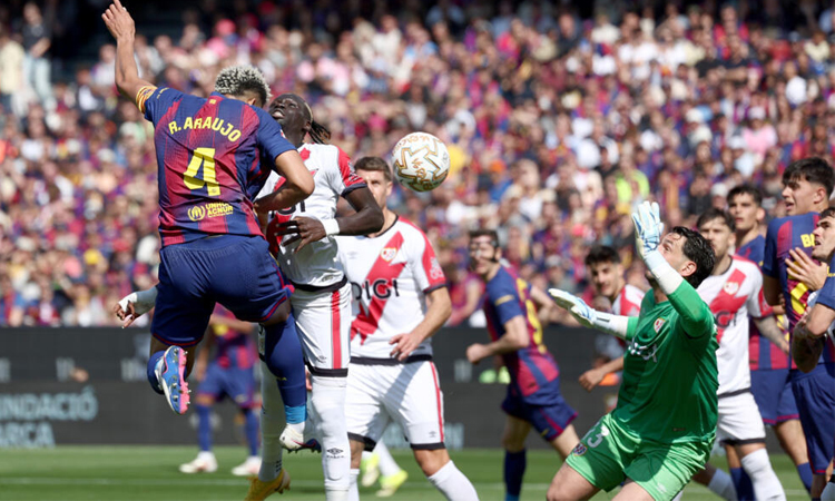 Real Madrid down Atletico in derby, leaders Barca edge Rayo