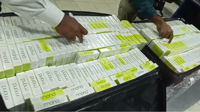 315 cartons of cigarettes recovered from a passenger baggage