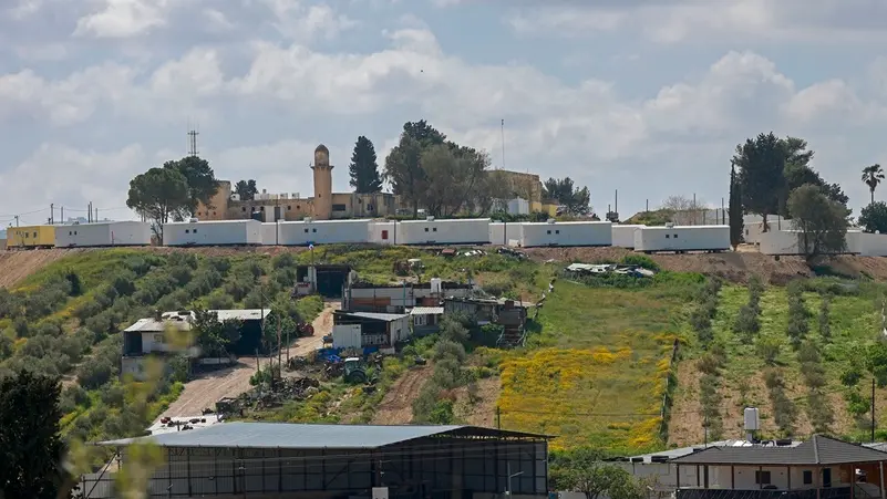 Palestinians say Israeli settlers kill man in raid on village