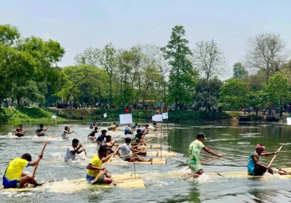 Traditional raft race marks Chaitra Sankranti at JU