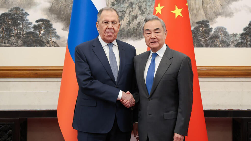 Lavrov blasts efforts to 'contain' Russia, China on Beijing visit