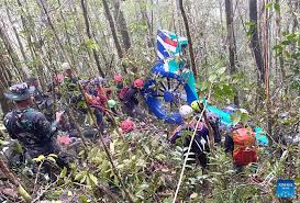 Debris found in search for missing helicopter carrying eight in Indonesia