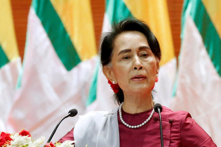 Myanmar mass prison sentence cut trims Suu Kyi's sentence