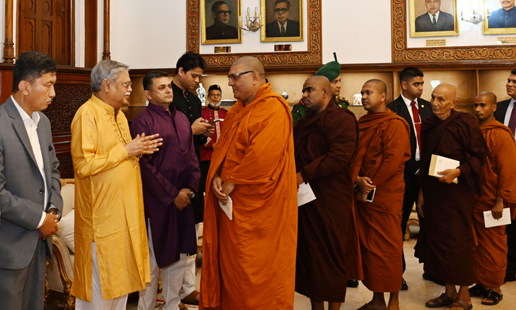 President urges Buddhist community to work for peace, harmony