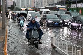 Eight dead as heavy rains lash China