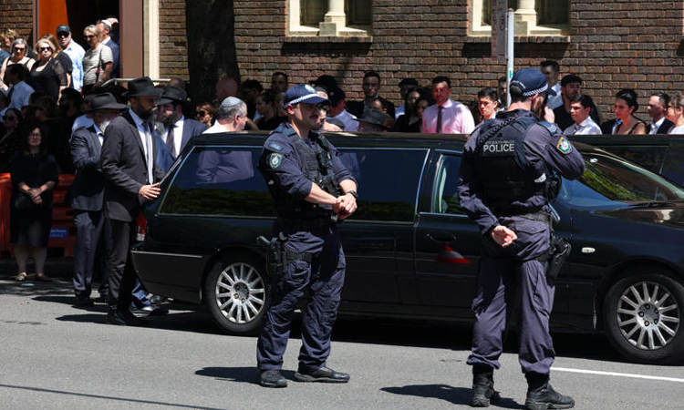 Sydney police hunt gunman who opened fire on funeral venue