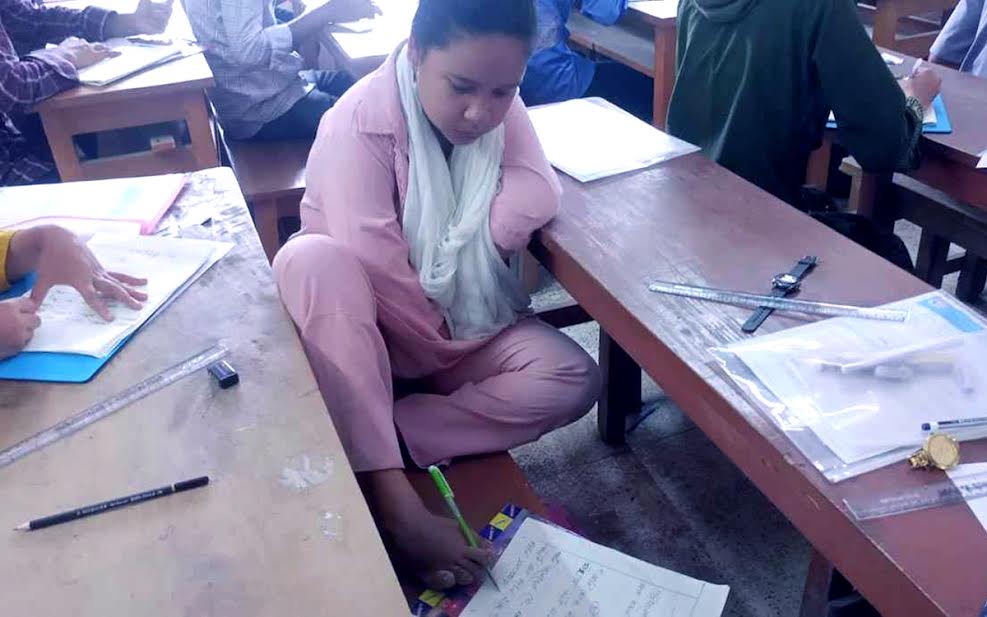 Disabled Poli Rani writes HSC exams with her feet, inspires a nation