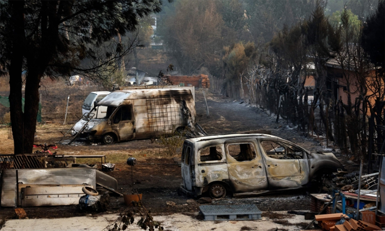 Spanish firefighters battle new blaze front as 15,000 evacuated