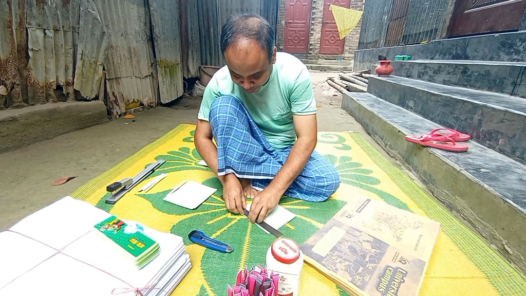 Blind Shariful earns acclaim by making eco-friendly notebooks, paper pens