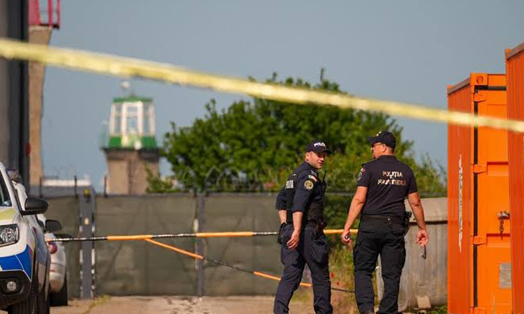 Romania holding suspected 'low-level agent' after pistols found near