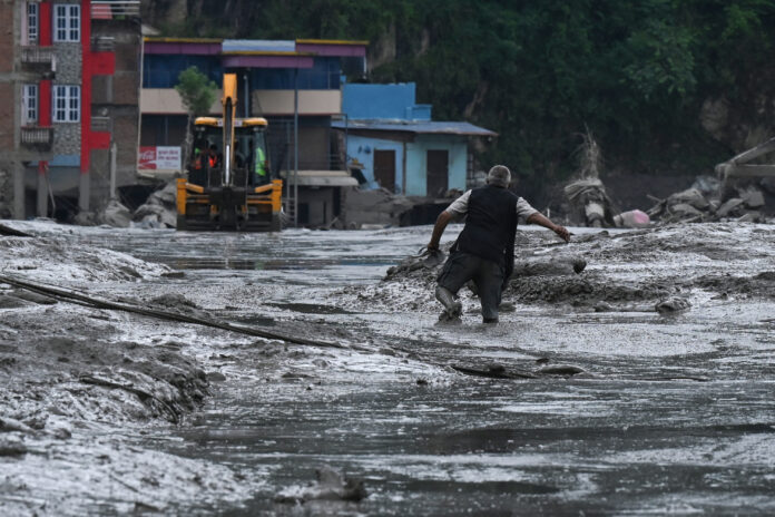 Search for missing after Nepal-Tibet floods kills at least 160