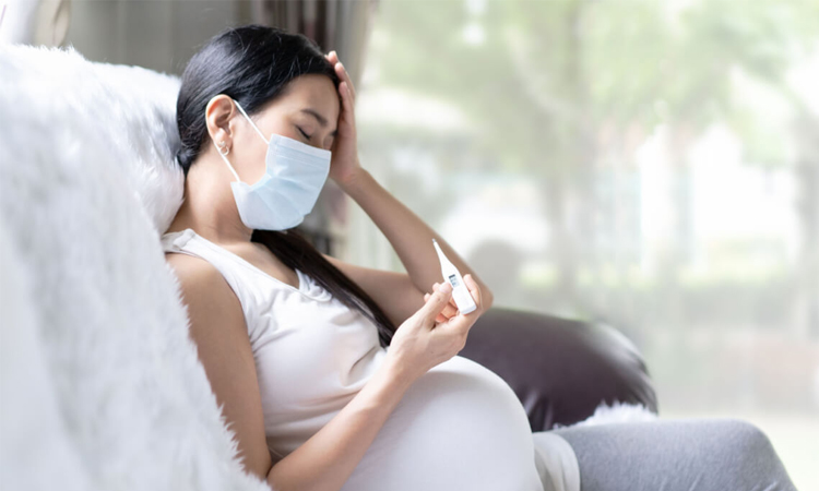 Experts urge pregnant women to seek prompt care if fever develops
