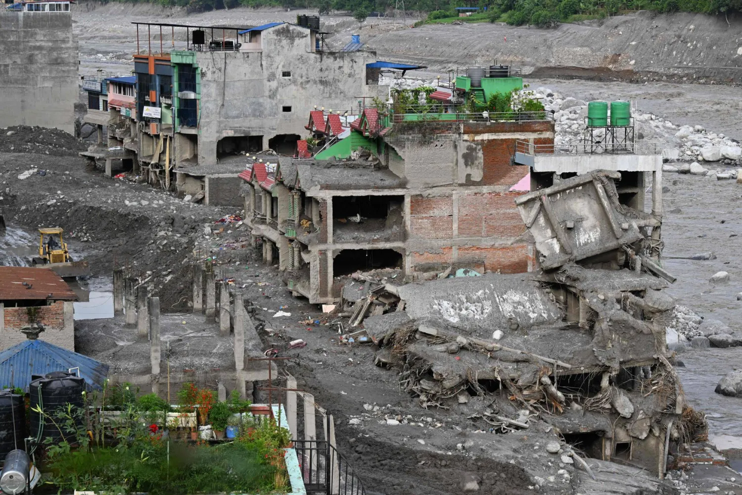 Rescuers continue grim search for Nepal flood survivors